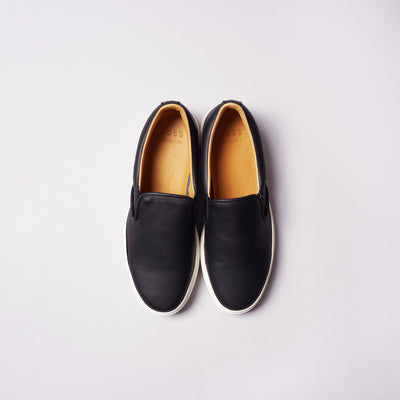 <TOSS> Lance Lance Slip-on Leather Sneakers / Black White